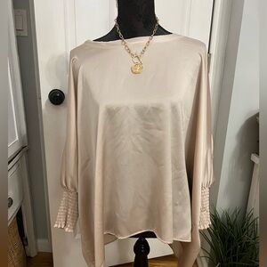 Woman’s champagne boutique top